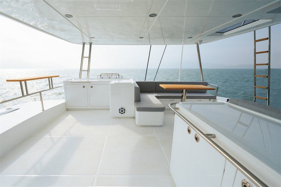 The aft deck with dining table and seating