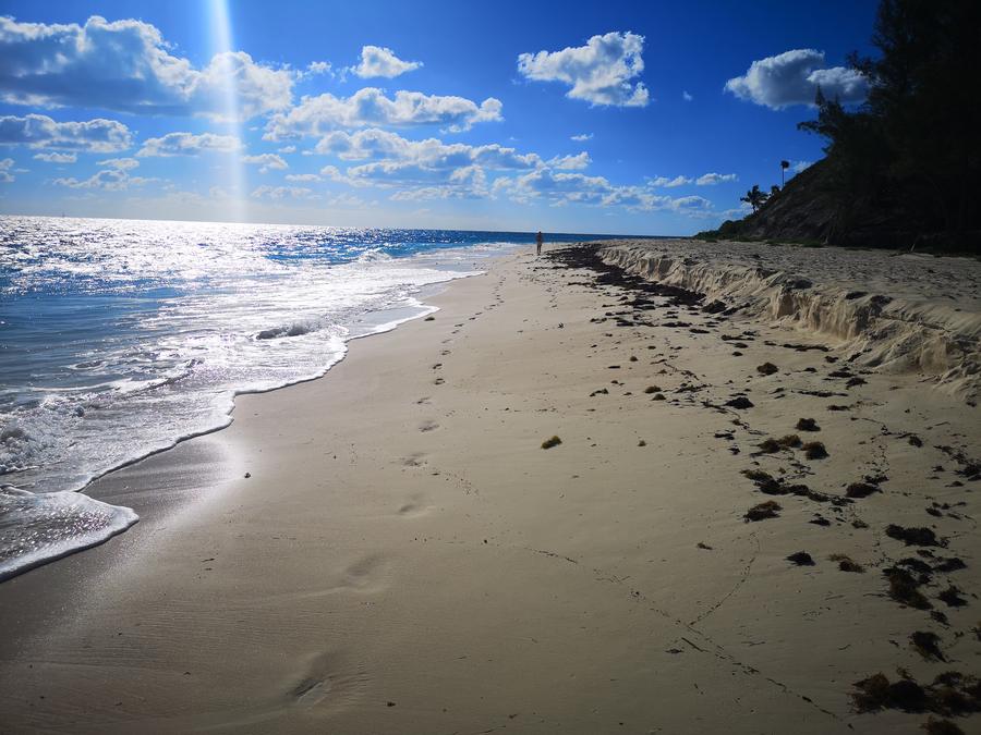 Footprints in the sand on a deserted beach near Lynyard Cay