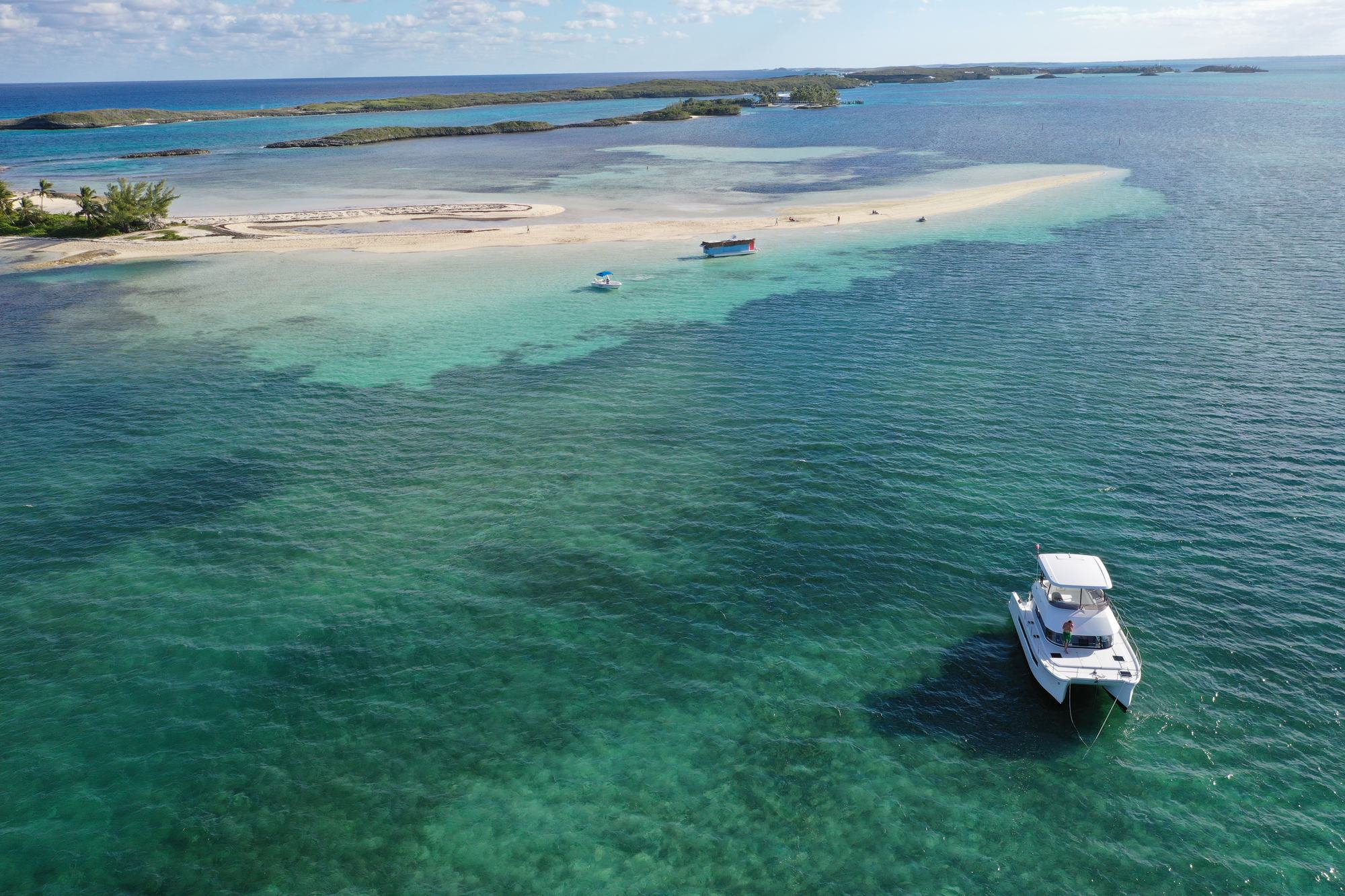 Catamaran anchored by a sandbar in Abaco