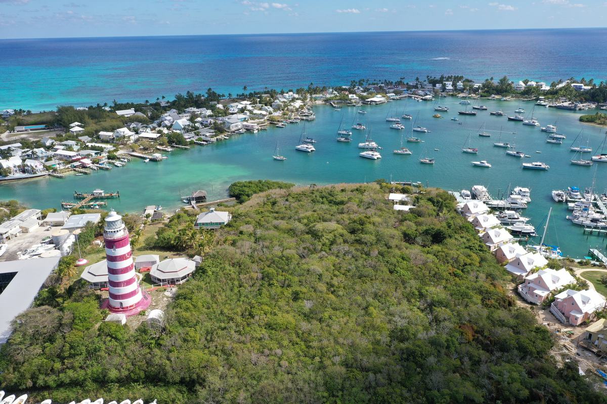 Aerial view of the lighthouse and harbour at Hope Town, Elbow Cay