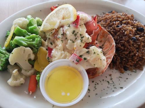 Local seafood dinner with lobster and rice